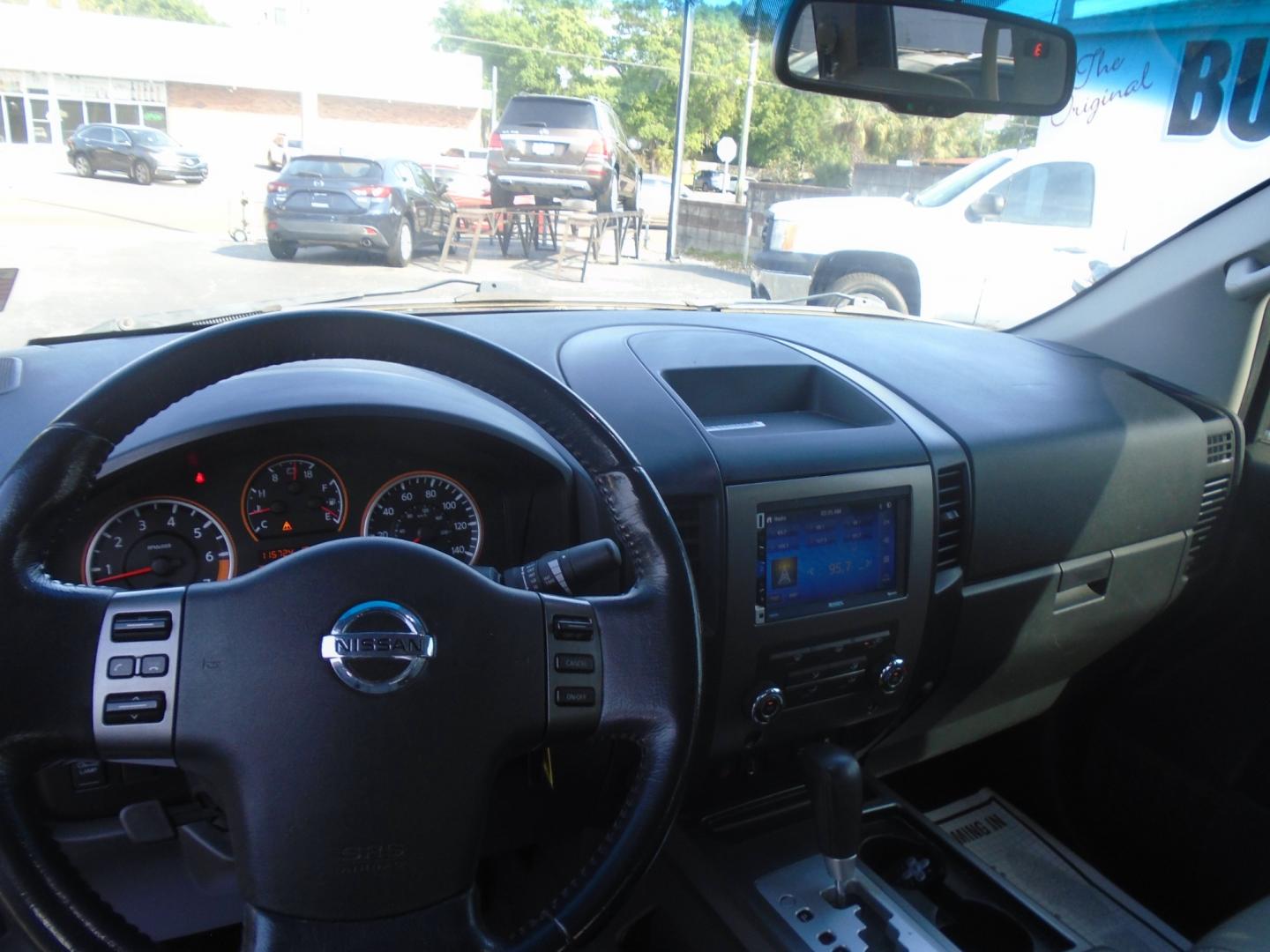 2012 Silver /Grey Nissan Titan SV Crew Cab 2WD (1N6BA0ED4CN) with an 5.6L V8 DOHC 32V FFV engine, 5-Speed Automatic transmission, located at 6112 N Florida Avenue, Tampa, FL, 33604, (888) 521-5131, 27.954929, -82.459534 - Photo#6